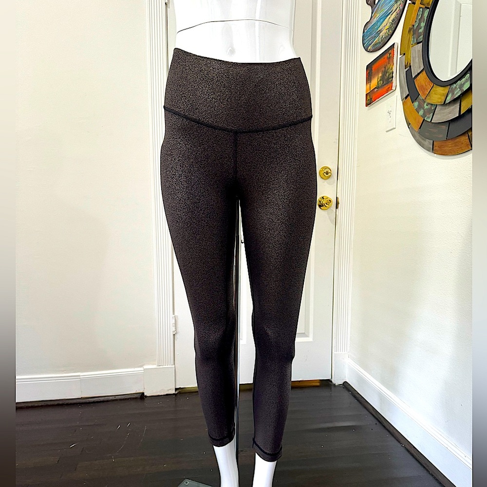 LULULEMON gold foil on black shimmer leggings, size 2